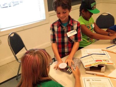 Northumberland County 4-H youth experiment with snap circuits during Maker activities at Mad Science day camp.
