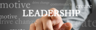 A finger points at the word "Leadership"